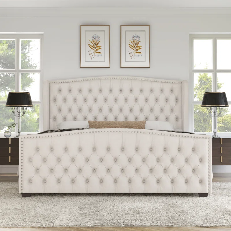 King-size tufted wingback upholstered bed with nailhead trim